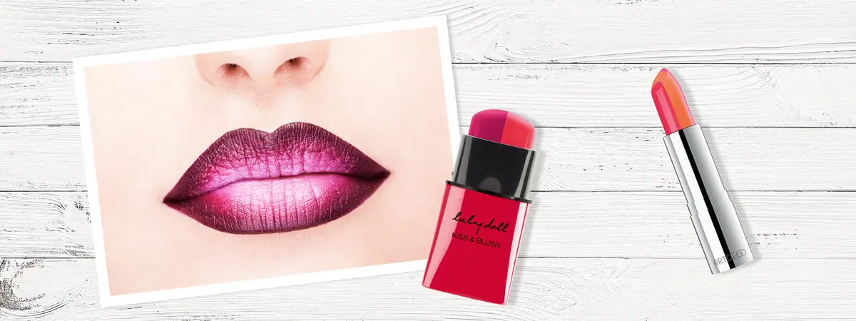 Geschminkte Lippen mit zwei Lippenstiften