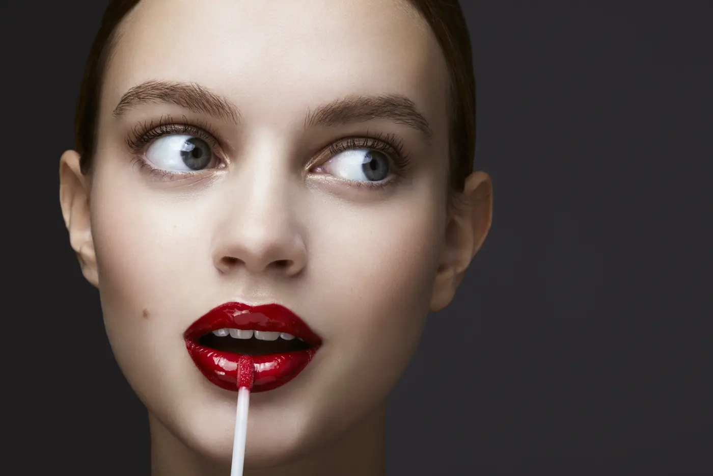 Frau mit Lip Gloss