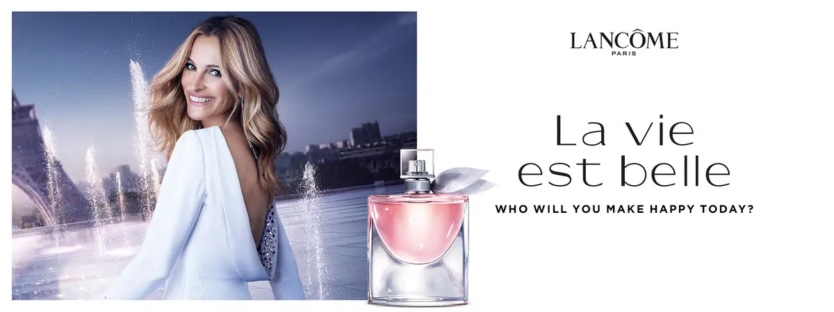 Julia Roberts und La vie est belle Parfumflakon
