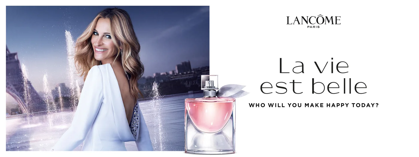 Julia Roberts und La vie est belle Parfumflakon