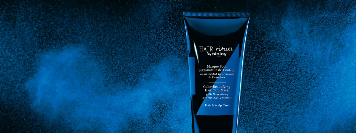 Produktabbildung der neuen Haarmaske von Hair Rituel by Sisley, blauer Hintergrund