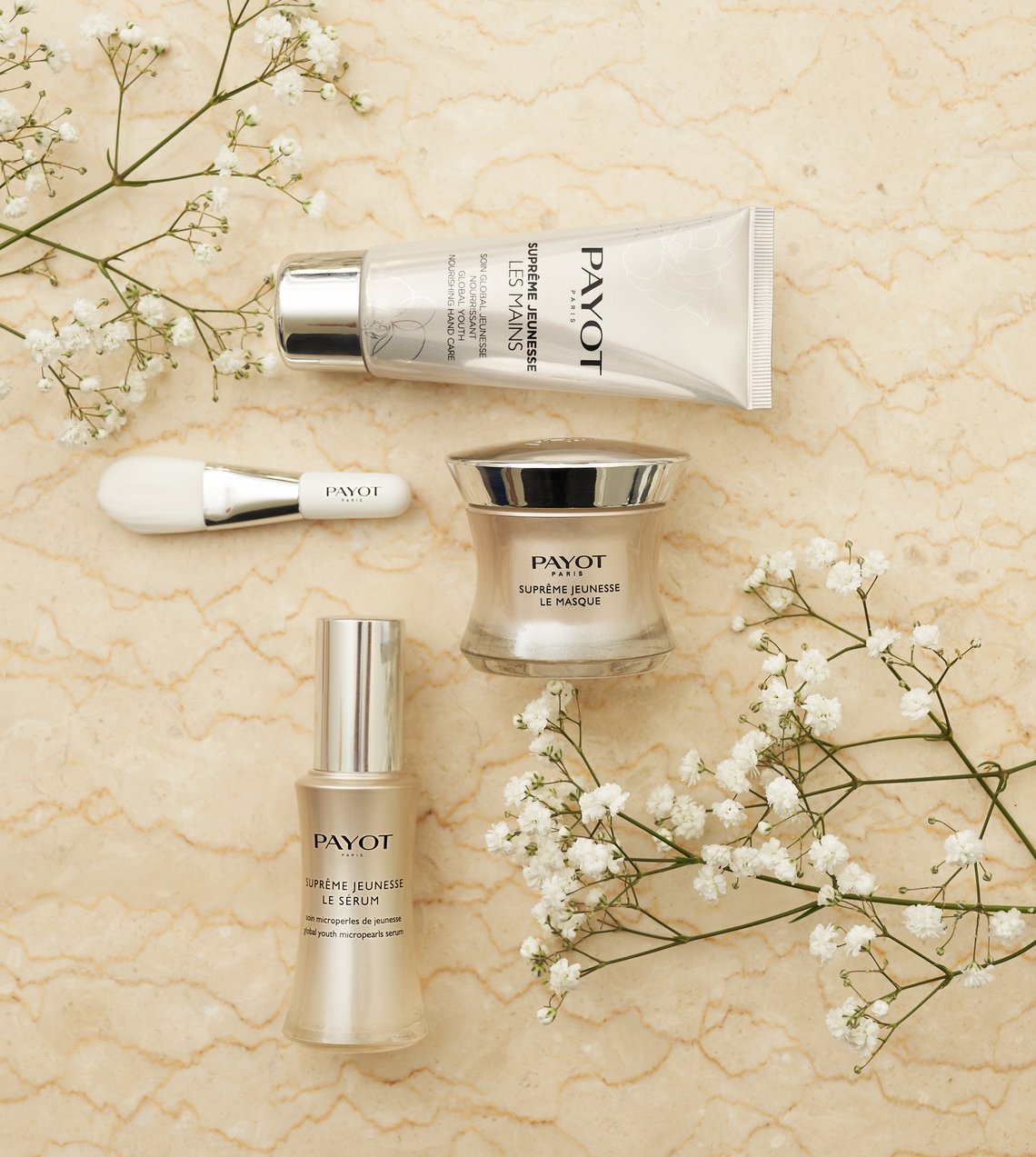 SUPRÊME JEUNESSE Pro-Aging Pflegeserie von Payot Beige-goldene Gesichtsmaske, Serum, Pinsel und Handcreme von Payot