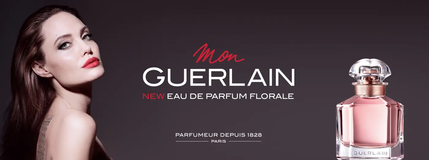 Angelina Jolie, Schriftzug und Parfumflakon