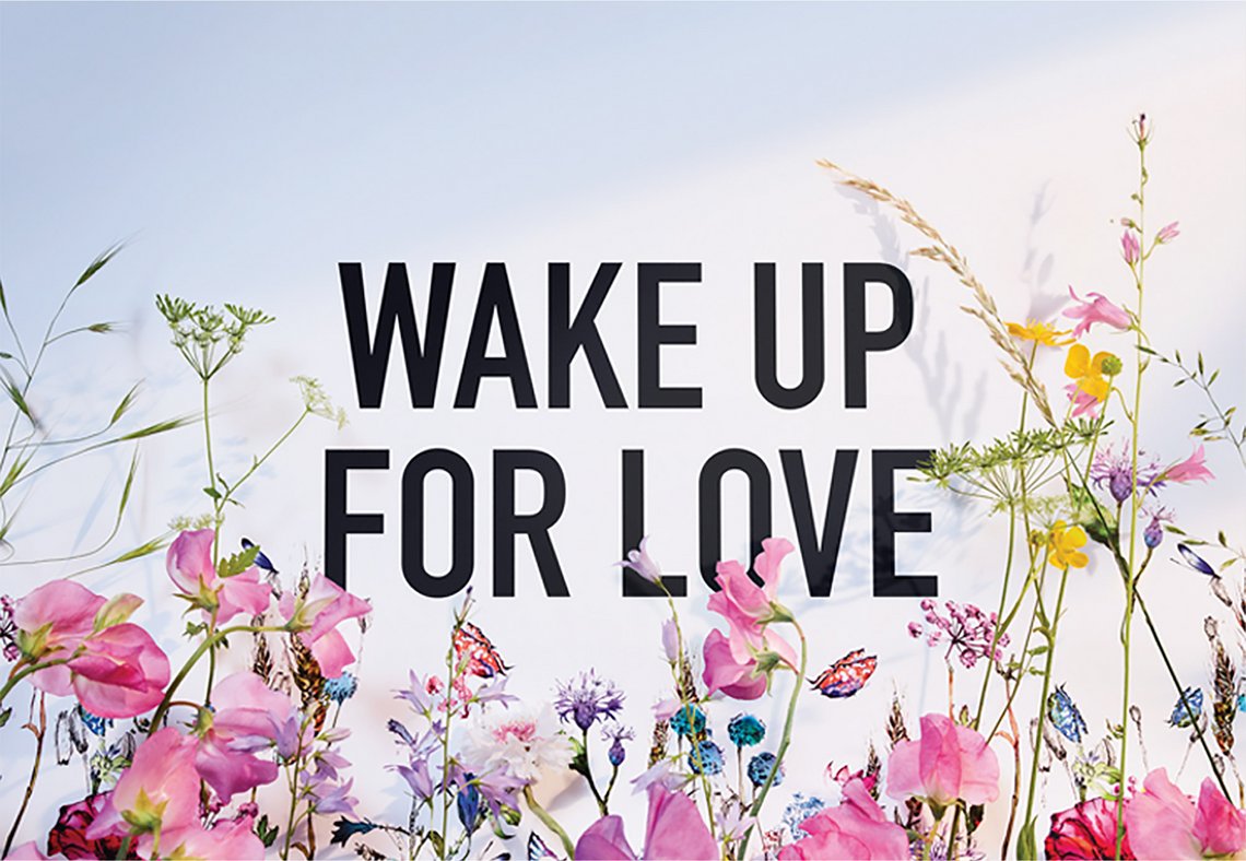 Schöne Blumen mit Spruch: Wake Up For Love