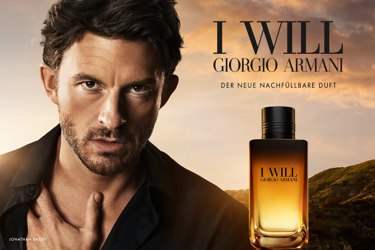 Giorgio Armani 'I Will' Parfüm-Kampagne mit Jonathan Bailey vor Sonnenuntergangs-Landschaft, daneben der Flakon des neuen nachfüllbaren Duftes