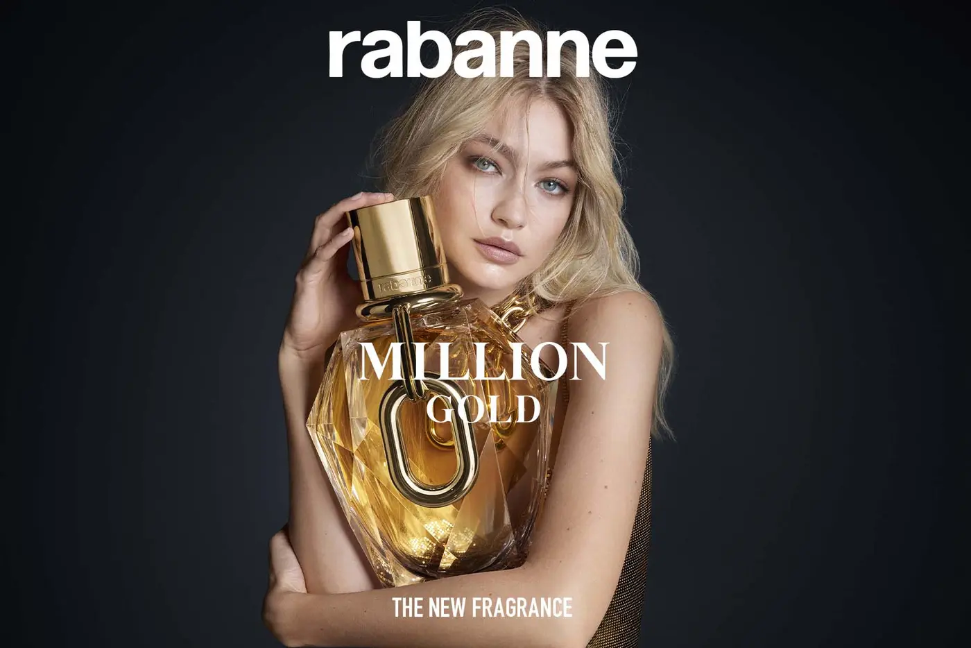 Model Gigi Hadid mit Flakon von MILLION GOLD FOR HER von Rabanne