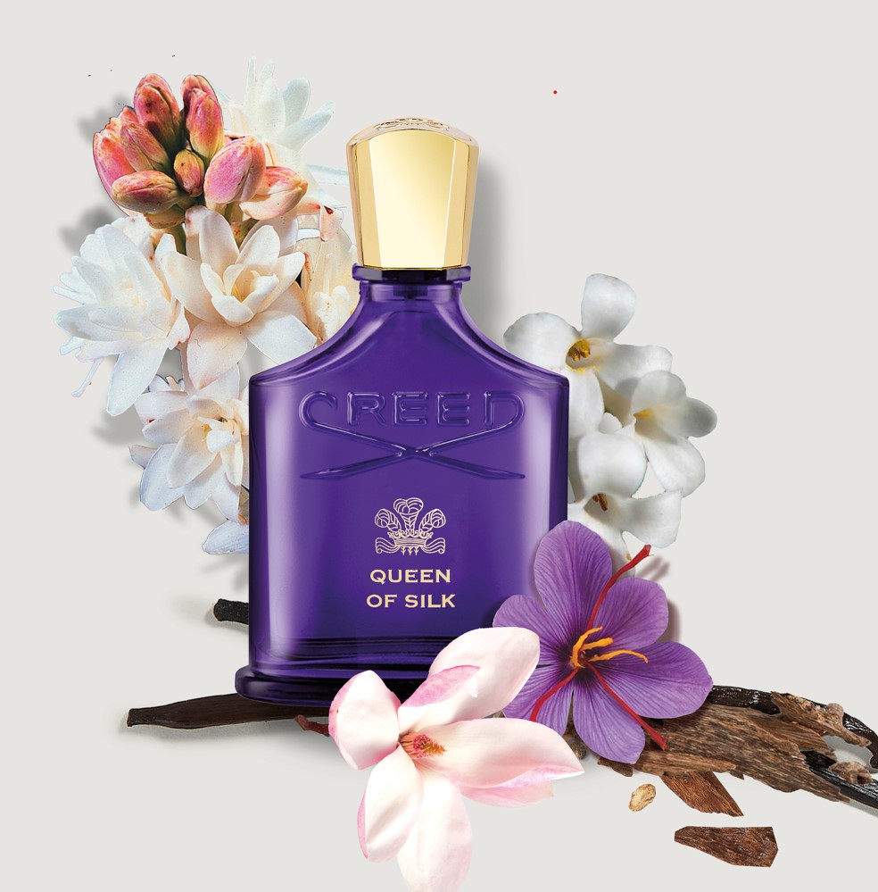 Flakon von QUEEN OF SILK mit arrangierten Ingredienzien